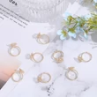 Kép 4/5 - Arany színű virág foglalatos, állítható gyűrű (17mm)