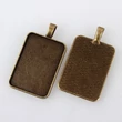 Kép 2/2 - Bronz színű téglalap alakú medálalap (33x23mm)