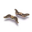 Kép 1/3 - Antikolt bronz színű szives angyalszárny köztes (7x20mm)/5db