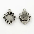 Kép 1/2 - Antikolt ezüst színű virágos kicsi medálalap (12mm)