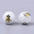 Kép 2/2 - Fehér karácsonyi arany csengő mintás üveggyöngy (10mm)