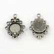 Kép 2/2 - Antikolt ezüst színű virágos kicsi medálalap (12mm)