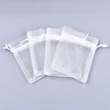 Kép 2/5 - Fehér színű organza tasak (12x9cm)