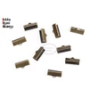Kép 1/4 - 10db antikolt bronz színű szalagvégzáró (16mm)