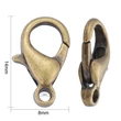 Kép 3/6 - 10db Antikolt bronz színű delfinkapocs (14x8mm)