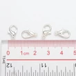 Kép 4/6 - 10db Ezüst színű delfinkapocs (12x6mm)