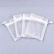 Kép 1/5 - Fehér színű organza tasak (12x9cm)