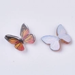 Sienna színű műanyag pillangó (11x9x3mm)