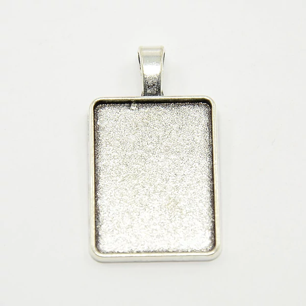 Antikolt ezüst színű téglalap alakú medálalap (18x25mm)