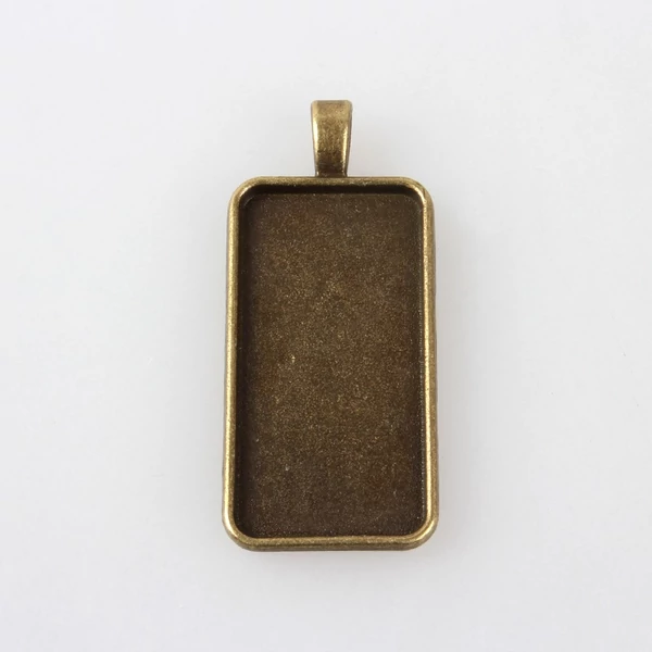 Bronz színű téglalap alakú medálalap (19x38mm)