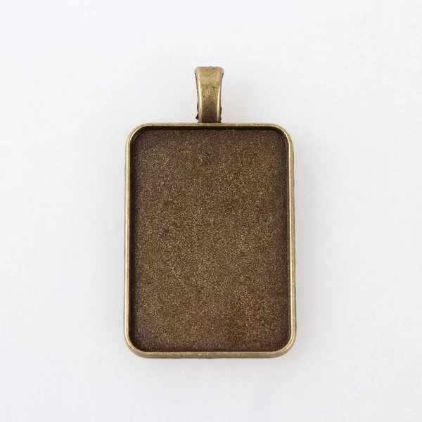 Bronz színű téglalap alakú medálalap (33x23mm)