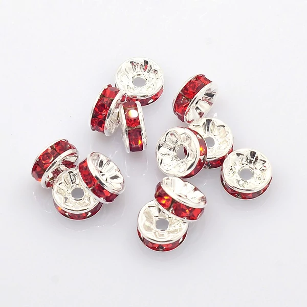 10db ezüst színű piros strasszos köztes (8x4mm)