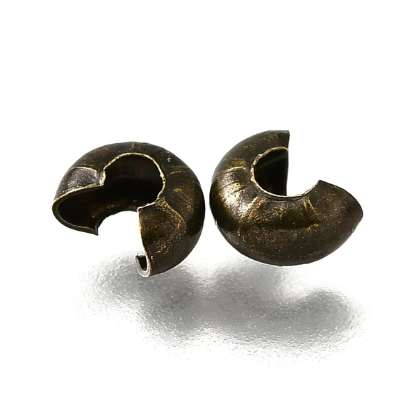 10db antikolt bronz színű csomórejtő