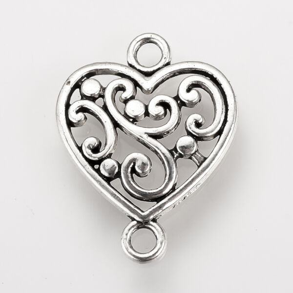 Antikolt ezüst színű szív alakú kapcsolóelem