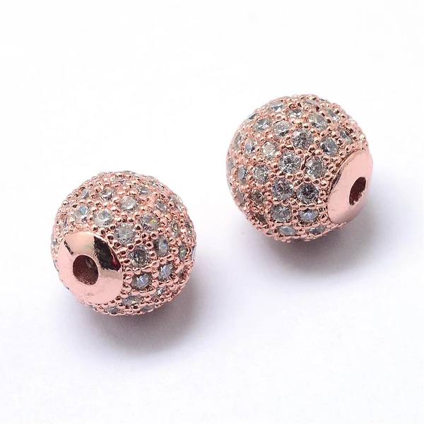 Strasszal díszített rozé arany cirkónia gyöngy 1db (6mm)