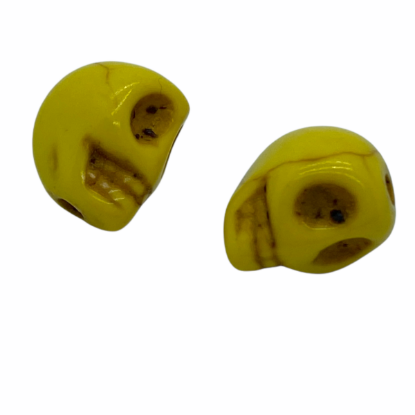 Szintetikus howlit sárga koponya gyöngy (9x7,5mm)
