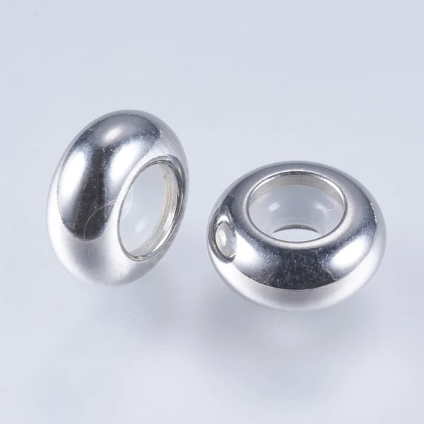 Nemesacél csúszókapocs (9x4,5mm)/1db