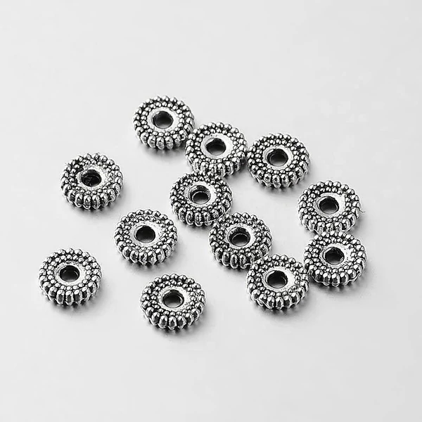 10db Antikolt ezüst fogazott köztes (7x2mm)