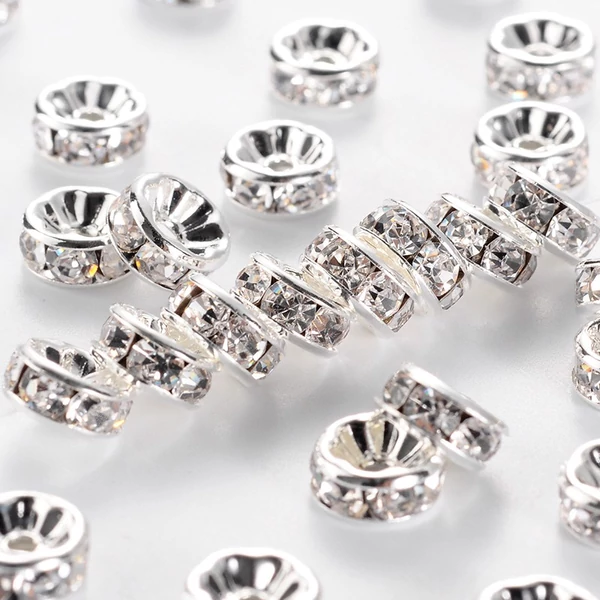 10db ezüst színű átlátszó strasszos köztes (8x4mm)