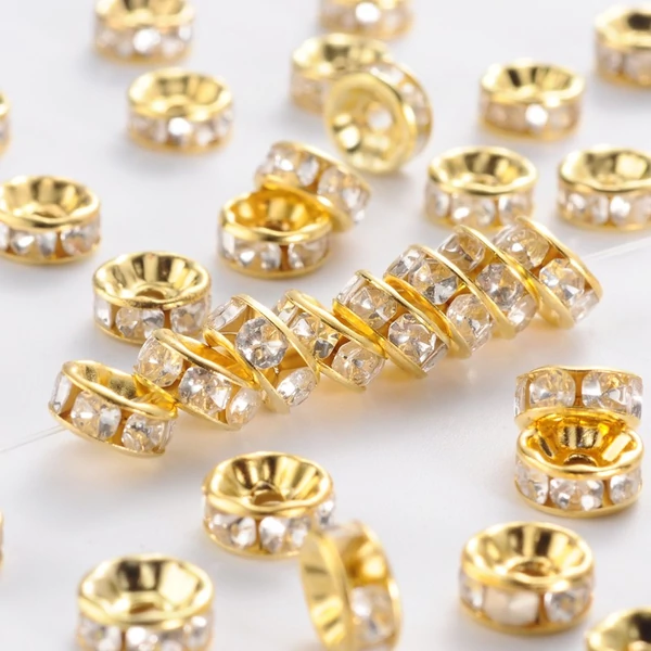 10db Világos arany színű strasszos köztes (6x3mm)