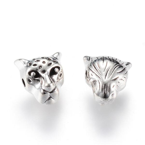 Antikolt ezüst színű leopárd fej alakú gyöngy (10x9x7mm)