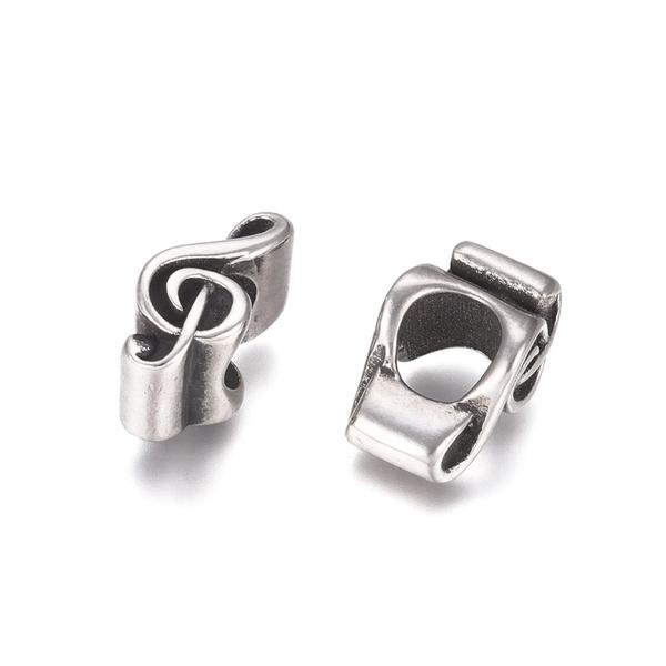 Nemesacél hangjegy köztes (14x6x8mm)