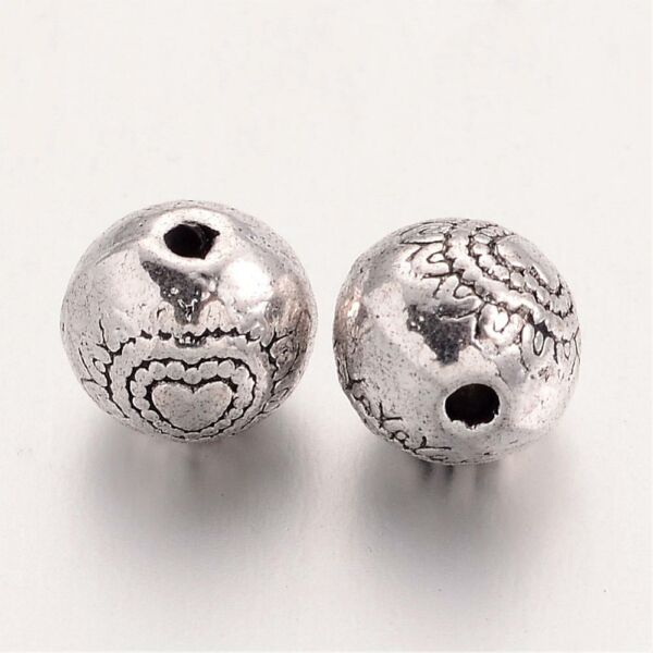 Antikolt ezüst színű szív mintás golyó alakú gyöngy (6mm)