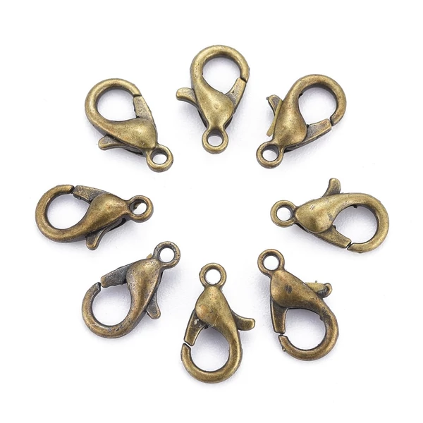 10db Antikolt bronz színű delfinkapocs (10x6mm)