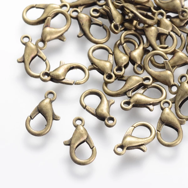 10db Antikolt bronz színű delfinkapocs (14x8mm)