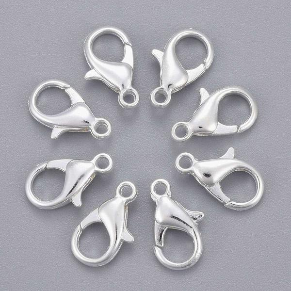 10db Ezüst színű delfinkapocs (14x8mm)