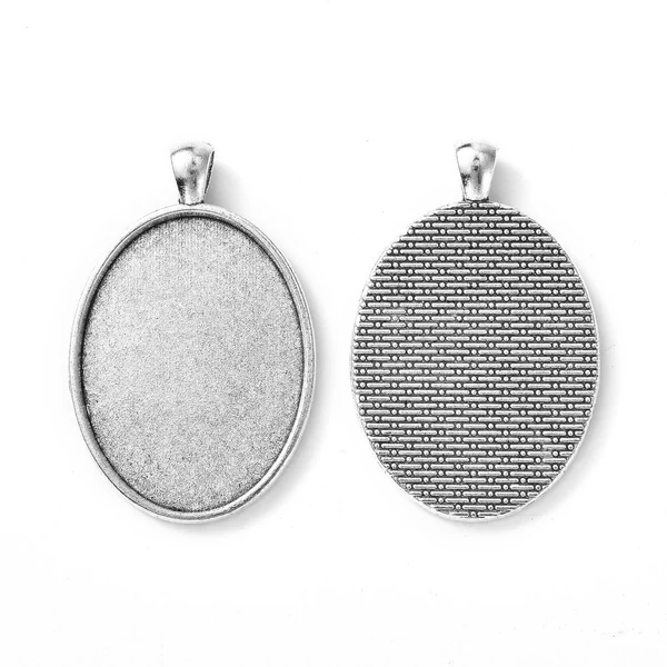 Antikolt ezüst színű sima medálalap (30x40mm)