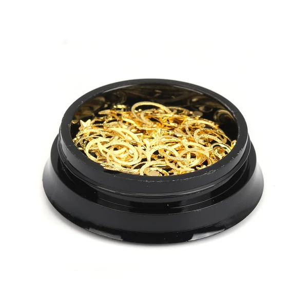 Arany fém díszítőelemek dobozban