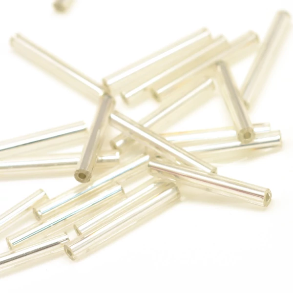 Áttetsző ezüst közepű szalmagyöngy (15x2,5mm)/15gr