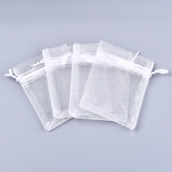 Fehér színű organza tasak (12x9cm)