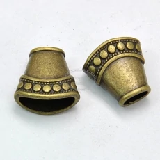 Antikolt bronz lapított gyöngykupak/végzáró